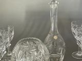 a lot of glass items that are on a table