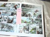 a picture of a page in a comic book on a bed