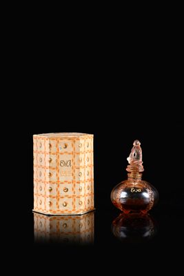 perfume bottle and box on a black background with reflection