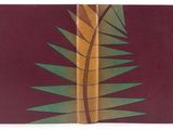 an image of a close up of a book with a palm leaf on it