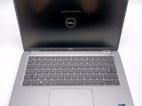 the dell laptop is open and ready to be used