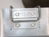 a close up of a stainless steel pot with a handle