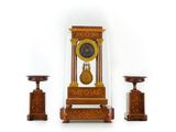 a clock that is sitting under a glass dome
