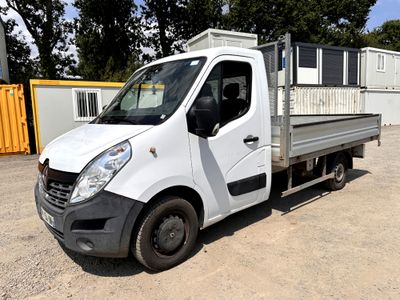 a white truck that is parked in a lot