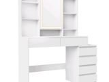 une photo d'un bureau blanc muni d'un miroir et de tiroirs