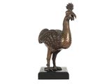 sculpture en bronze représentant un oiseau sur un socle noir