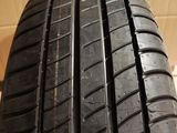 a close up of a tire on a cardboard box