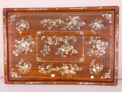 a wooden tray with flowers and birds on it