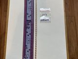 une photo représentant une feuille de papier et une règle posées sur une table