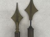 pair of antique brass arrow finings from the early 20th century