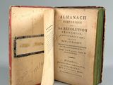 an old book opened to reveal an open page of a book