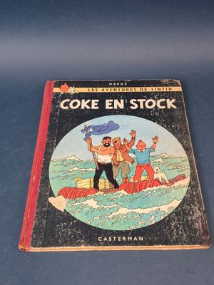 un livre sur lequel figure la photo d'un homme dans un bateau sur l'eau