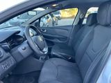 the interior of a car with a black leather seat and dashboard