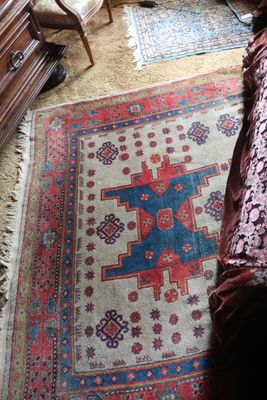 a rug on the floor in a living room