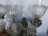 a lot of glass vases that are sitting on a table