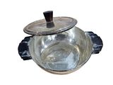 a silver pan with a lid on a white background