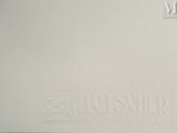 a white box with a logo on it sitting on a table