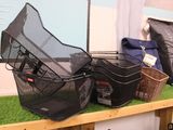 two baskets that are sitting on a shelf