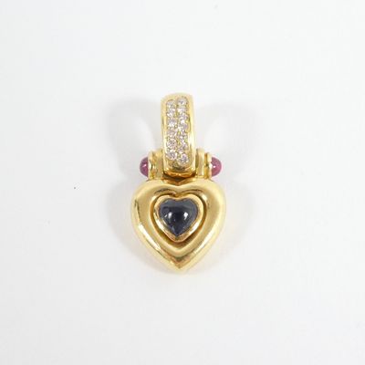 an image of a gold heart pendant with a sapphire and diamonds