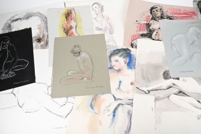 a lot of drawings that are on the table