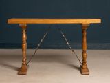 an image of a wooden table with two legs and a wooden top