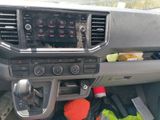 a car dashboard with various items in it