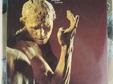 the cover of rodin magazine with a statue of a man holding his hand up