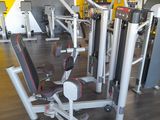 an image of a gym room with a variety of machines