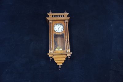a clock hanging on the wall of a room