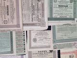 several different types of certificates are displayed on a black surface