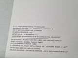 a close up of a page of a book on a table