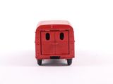 a red toy truck that is sitting on a white surface