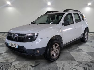 a picture of a white dacia parked in a garage