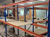 a large room with a lot of shelves and tables in it