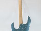 a blue electric guitar on a stand on a white background