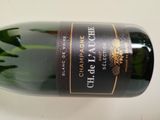 a bottle of wine that is sitting on a table