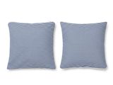 a pair of blue and white striped pillows on a white background