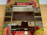 a picture of a picture of a mirror on a table