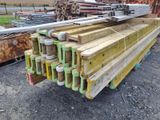 several pieces of wood are stacked on top of each other in a pile