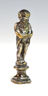a statue of a boy holding a baby on top of a pedestal