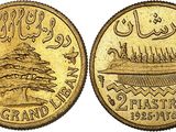 une pièce d'or sur laquelle est représenté un bateau