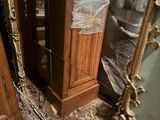 a large mirror in the corner of a room