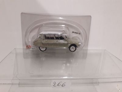 a small toy car in a clear display case