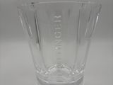 the glass vase is empty and ready to be used as a vase