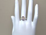 a ring on a mannequin hand with a ring on it