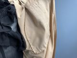 a close up of a pile of clothes on a blue background