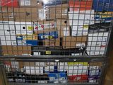 a large metal cart with many boxes on top of it