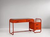 un bureau orange à deux tiroirs avec une structure en métal