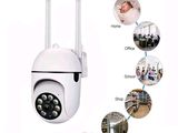 an image of a white camera with many pictures around it