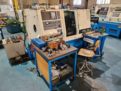 an image of a machine shop with many machines